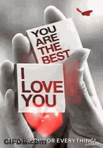 A Person Is Holding A Card That Says `` You Are The Best I Love You '' In Their Hand . GIF