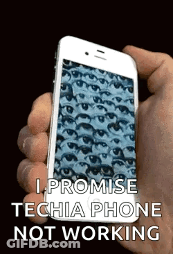 A Person Is Holding A Cell Phone In Their Hand With A Picture Of Eyes On It . GIF