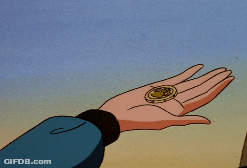 A Person Is Holding A Coin In Their Hand That Has The Letter S On It GIF