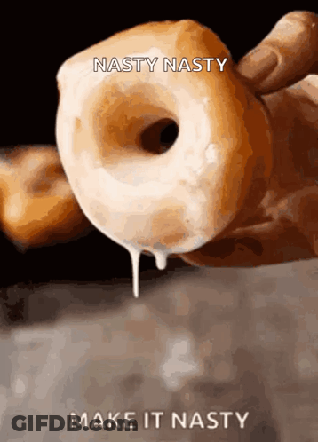 A Person Is Holding A Donut With The Words Nasty Nasty Make It Nasty Below It GIF
