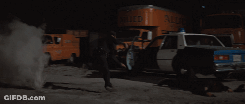 A Person Is Holding A Flashlight In Their Hand And It Is Glowing In The Dark GIF