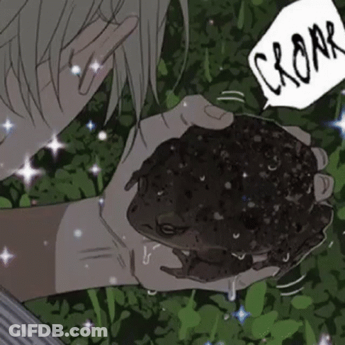 A Person Is Holding A Frog In Their Hands And Talking To It . GIF