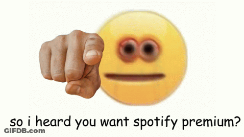 A Person Is Holding A Green Spotify Premium Card GIF