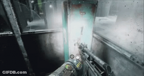 A Person Is Holding A Gun In A Video Game And A Light Is Coming Out Of A Door . GIF