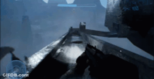 A Person Is Holding A Gun In A Video Game With The Number 5 On It GIF