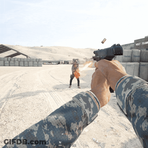 A Person Is Holding A Gun In Front Of A Building That Says Next Train GIF