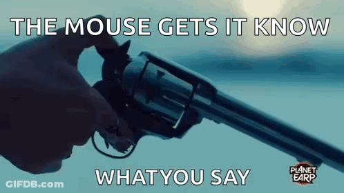 A Person Is Holding A Gun With A Mouse On It And The Mouse Gets It Know What You Say GIF