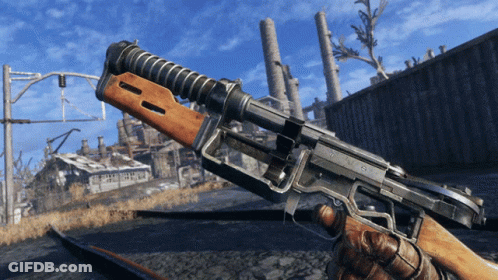 A Person Is Holding A Gun With The Number 8 On The Side GIF