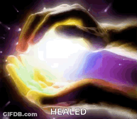 A Person Is Holding A Light In Their Hands And The Word Healed Is On The Bottom Of The Image GIF