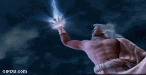 A Person Is Holding A Lightning Bolt In Their Hand While Standing In Front Of A Cloudy Sky . GIF