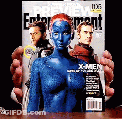 A Person Is Holding A Magazine That Says X-Men GIF