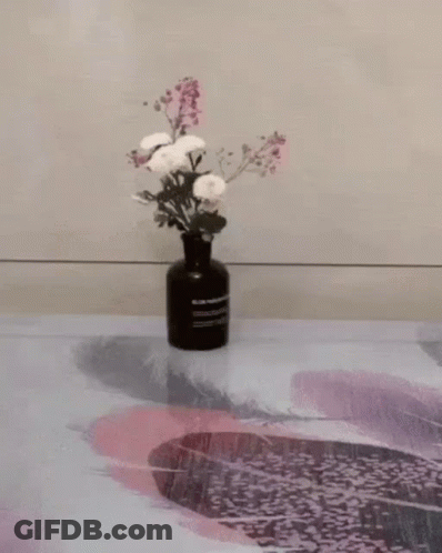 A Person Is Holding A Mason Jar Shaped Bag That Looks Like A Mason Jar GIF