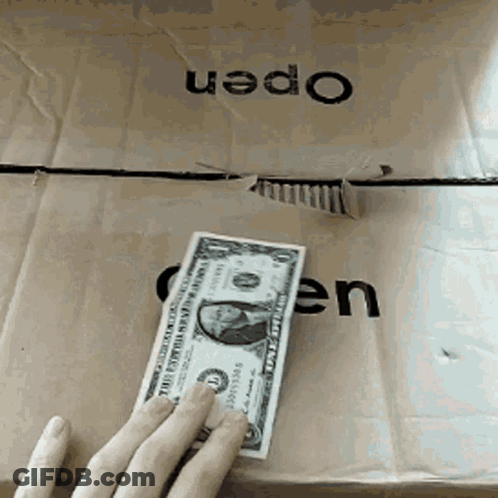 A Person Is Holding A One Dollar Bill In Front Of A Cardboard Box That Says Open GIF