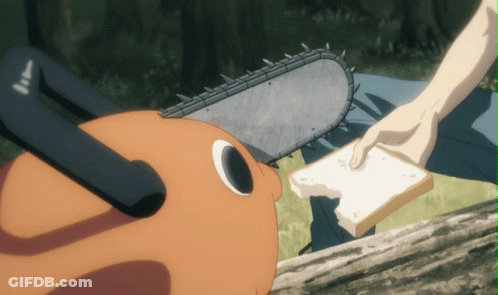 A Person Is Holding A Piece Of Bread In Front Of A Chainsaw That Has The Number 11 On It GIF