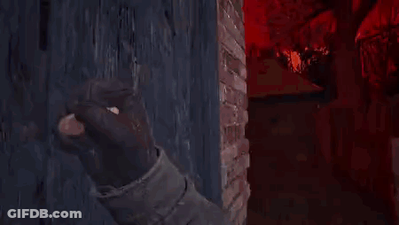 A Person Is Holding A Piece Of Bread In Their Hand In Front Of A Brick Wall In A Video Game . GIF
