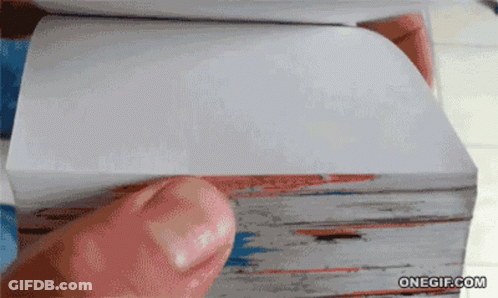 A Person Is Holding A Piece Of Paper In Front Of A Onegif.com Logo GIF