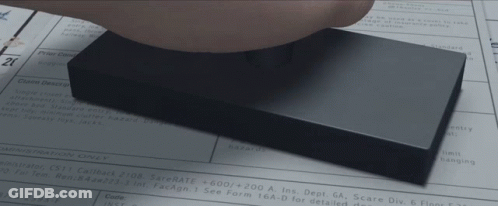 A Person Is Holding A Piece Of Paper That Says Claim Description GIF