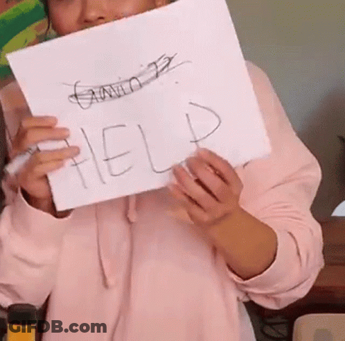 A Person Is Holding A Piece Of Paper That Says Help . GIF