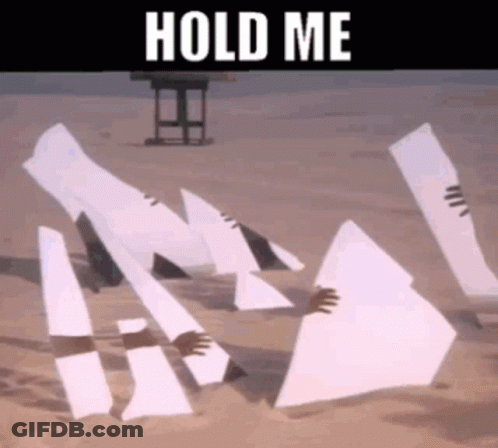 A Person Is Holding A Piece Of Paper That Says Hold Me On It . GIF