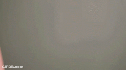 A Person Is Holding A Piece Of Pink Paper That Says Sec GIF