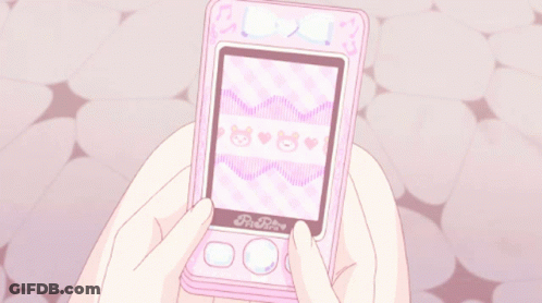 A Person Is Holding A Pink Phone That Says Pi-Rite On The Front GIF