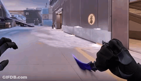 A Person Is Holding A Purple Knife In A Video Game . GIF