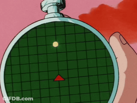 A Person Is Holding A Radar With A Red Triangle Pointing To The Left GIF
