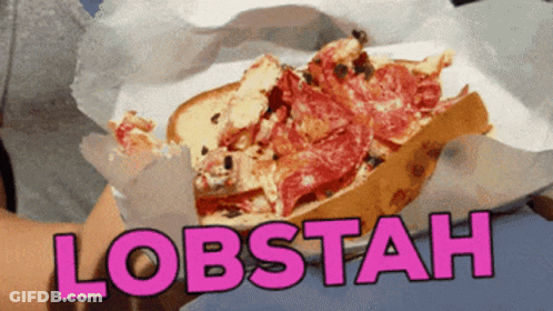 A Person Is Holding A Sandwich With The Word Lobstah On It GIF
