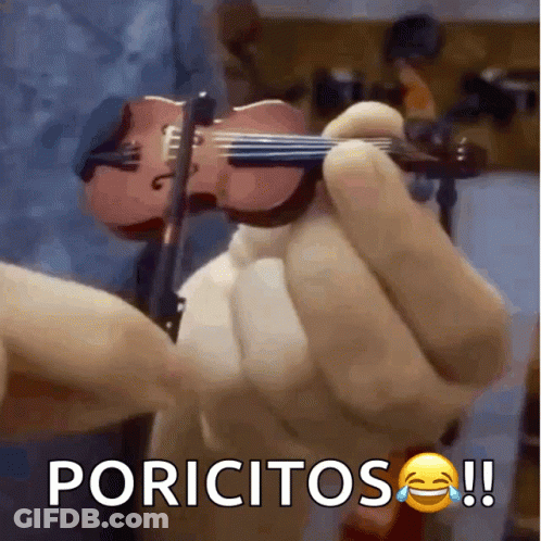 A Person Is Holding A Small Violin With The Words Poricitos Written On The Bottom GIF