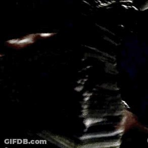 A Person Is Holding A Stack Of 100 Dollar Bills In Their Hand GIF
