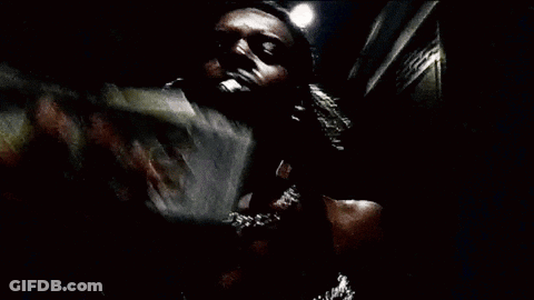 A Person Is Holding A Stack Of 100 Dollar Bills GIF