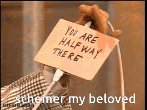 A Person Is Holding A Sticky Note That Says " You Are Halfway There " GIF
