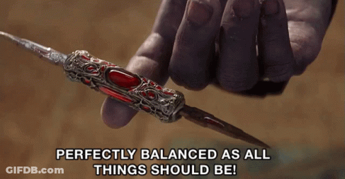 A Person Is Holding A Sword With The Words Perfectly Balanced As All Things Should Be GIF