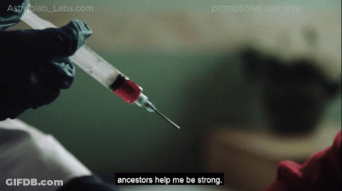 A Person Is Holding A Syringe That Says Ancestors Help Me Be Strong On It GIF