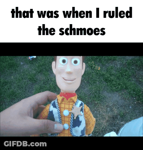A Person Is Holding A Toy That Says That Was When I Ruled The Schmoes On It GIF