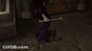 A Person Is Holding Two Guns In Their Hands And One Of Them Is Shooting . GIF