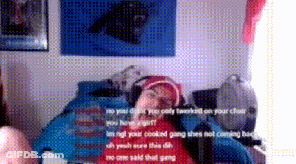 A Person Is Laying On A Bed With A Black Panther On A Wall Behind Them GIF