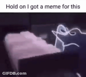 A Person Is Laying On A Bed With A Light Coming Out Of The Corner Of The Bed . GIF