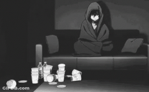 A Person Is Laying On A Couch In A Living Room With A Lot Of Trash On The Floor . GIF