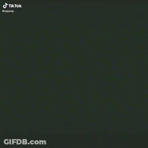A Person Is Laying On Their Back On A Green Background With A Green Line . GIF