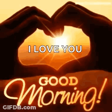 A Person Is Making A Heart Shape With Their Hands In Front Of The Sun With The Words `` I Love You Good Morning '' . GIF