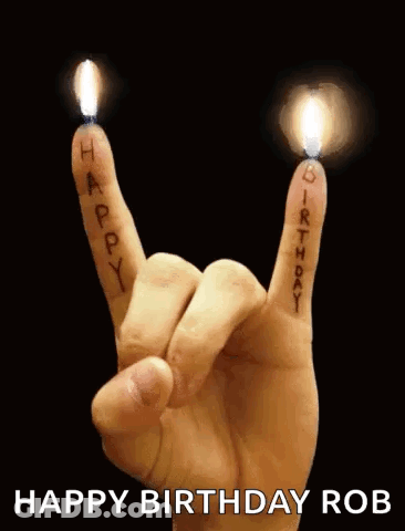 A Person Is Making A Rock And Roll Sign With Their Fingers . GIF