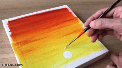 A Person Is Painting A Sunset On A Canvas With The Words Wow Art Below GIF