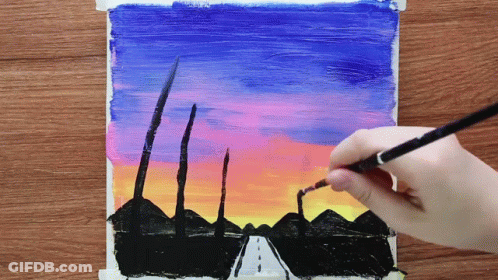 A Person Is Painting A Sunset Over A Road With A Brush GIF