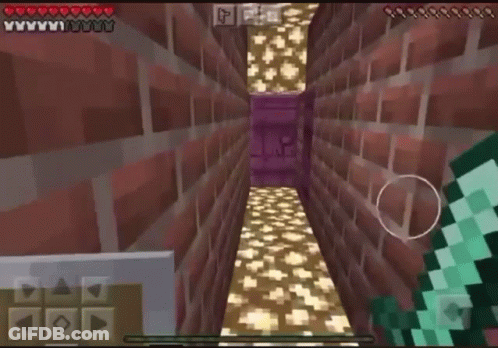 A Person Is Playing A Video Game Called Minecraft On Their Phone GIF
