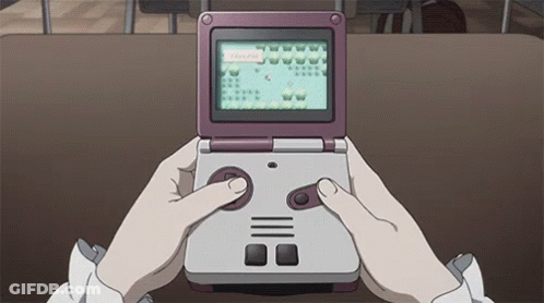 A Person Is Playing A Video Game On A Handheld Console . GIF