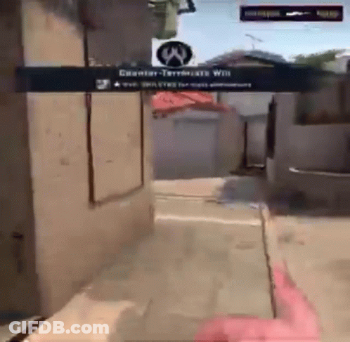 A Person Is Playing A Video Game With A Sign That Says Counter-Terrorists Will GIF