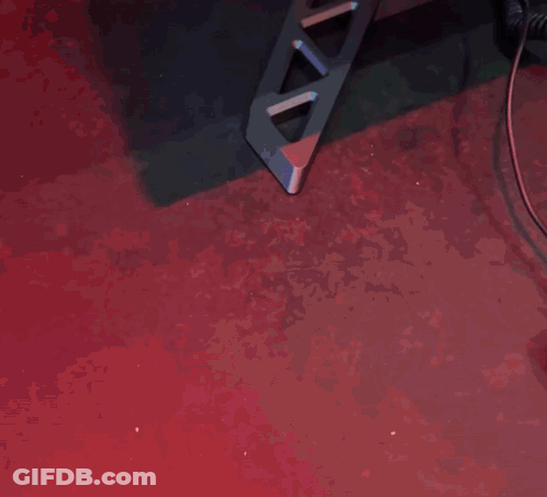 A Person Is Playing A Video Game With A Xbox Controller And A Keyboard GIF