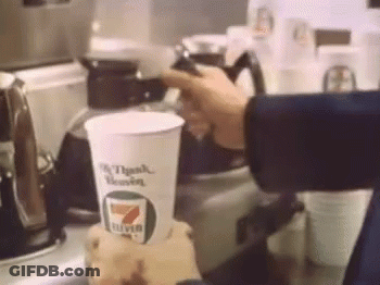 A Person Is Pouring Coffee Into A Cup That Says 7 Eleven On It GIF