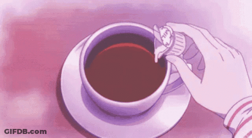 A Person Is Pouring Sugar Into A Cup Of Coffee On A Pink Background . GIF